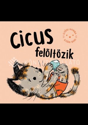 Kép: Cicus felöltözik